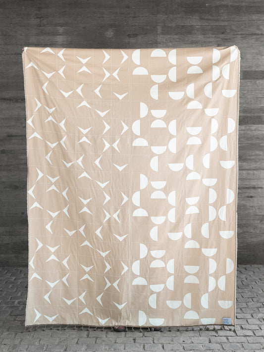 Paño geometrico beige