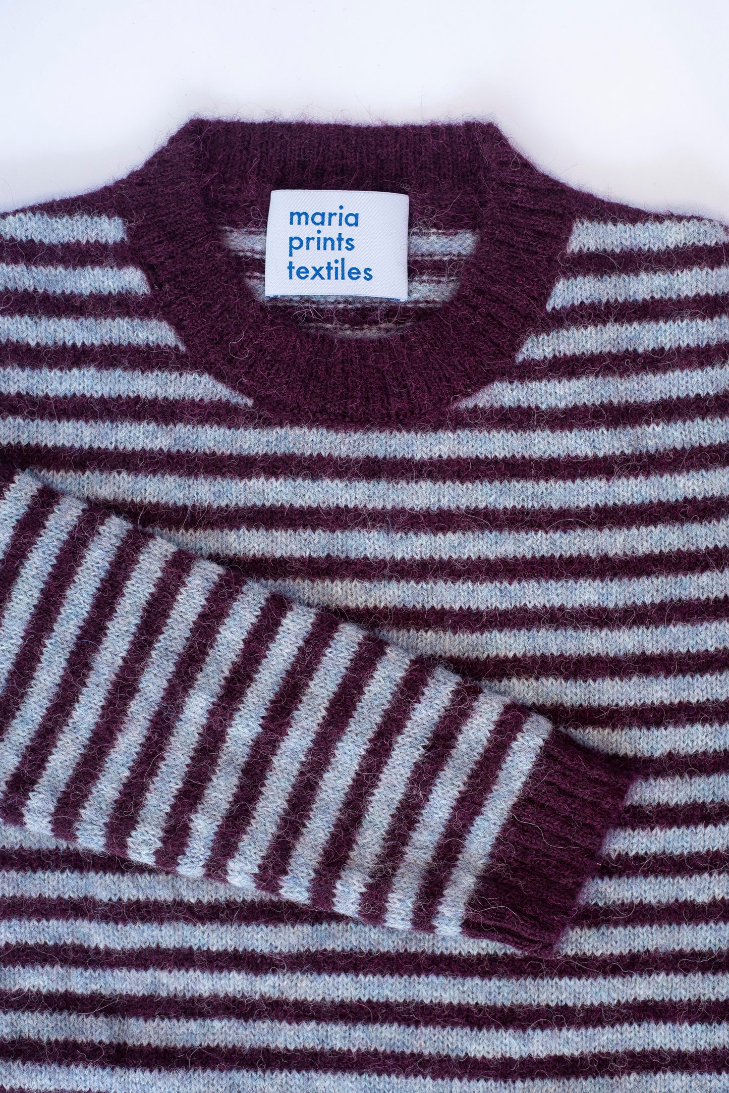 Sweater rayas ciruela y celeste